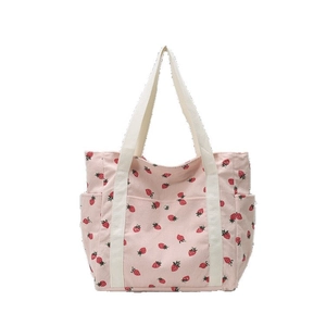 Borsa tote in velluto a coste rosa con stampa di fragole e spalline larghe bianche