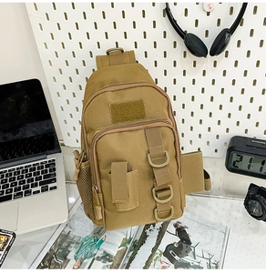 Macro shot of khaki tactical shoulder bag with metal D-ring and durable webbing straps