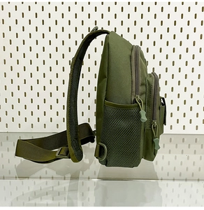 Army green tactical nylon sling bag with mesh side pockets and padded breathable strap
