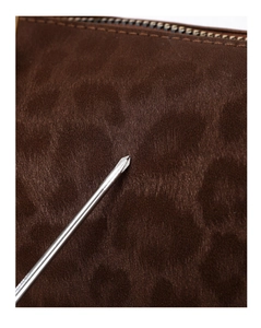 Detailed quality test of durable suede leopard bucket bag with scratch resistant fabric