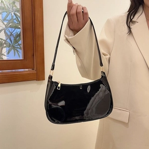 Minimalist black patent leather baguette shoulder bag for women with glossy finish