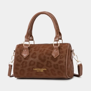 Brown leopard embossed velvet bucket bag with top handles and detachable shoulder strap
