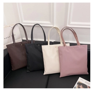 Detailed view of four pleated tote bags in dark coffee, black, beige, and pink colors