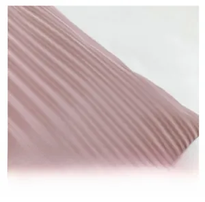 Close-up detail of the pink purple pleated fabric and fine edge binding on the tote bag