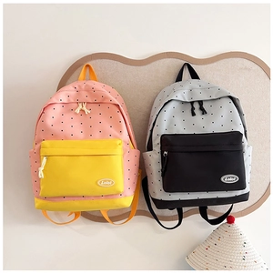 Polka dot pattern backpacks in pink-yellow and grey-black with Lolol zip pockets