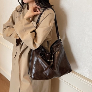 Vintage dark brown faux leather tote bag with gold hardware for women's autumn style