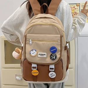 Minimalist beige and brown colorblock student backpack with pins and bear charm