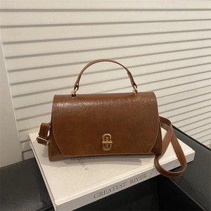 Vintage brown PU leather crossbody bag with elegant gold metal twist lock and top handle