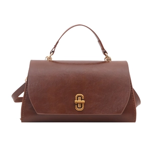 Vintage brown PU leather crossbody bag with a classic gold twist lock and top handle