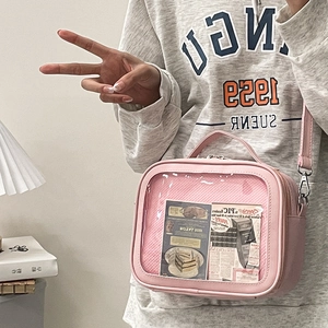 Pink Ita Bag for anime fans featuring a large clear window and adjustable shoulder strap