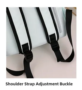 Close-up of adjustable black shoulder strap buckles on the light blue sport backpack