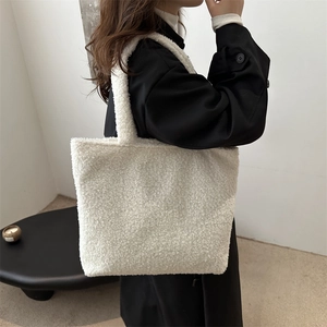 White fuzzy plush tote bag for women featuring a soft sherpa texture and large capacity