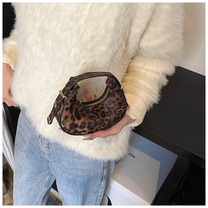 Mini crescent bag with leopard print featuring gold hardware and zipper detail