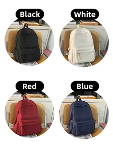 Detail view of large-capacity minimalist backpacks in black, white, red, and blue colors