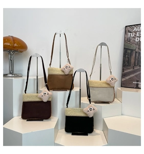 Plush crossbody bags in four colors with suede fabric and fleece trim detailing