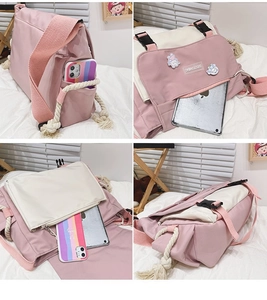 Detailed views of pink canvas messenger bag featuring multi-pocket storage and side fringe
