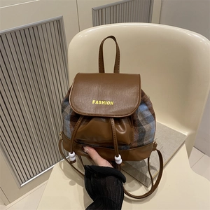 Vintage plaid bucket backpack with brown leather flap and stylish drawstring closure