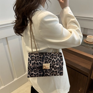 Chic leopard print shoulder bag with gold chain strap and metal lock for women