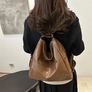Retro brown large capacity multi-use backpack and tote bag for commuting and travel