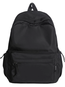 Minimalist black nylon backpack with spacious main compartment and front zipper pocket