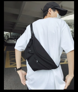 Waterproof black crossbody chest bag for men with multiple zipper pockets and adjustable strap