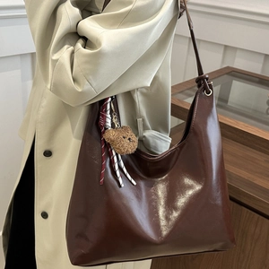 Vintage brown leather tote bag for women with cute bear charm and large capacity