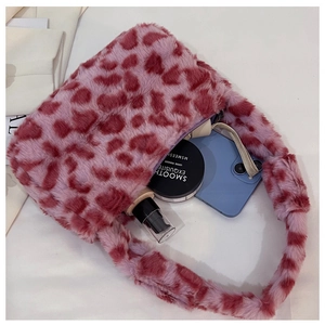 Pink leopard print plush shoulder bag showing interior space for phone and makeup