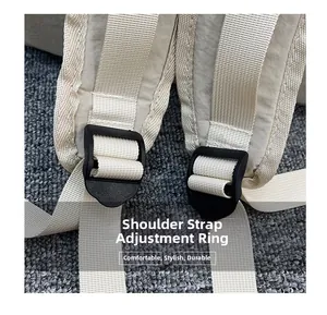 Detail of adjustable backpack shoulder strap with durable buckle and nylon webbing