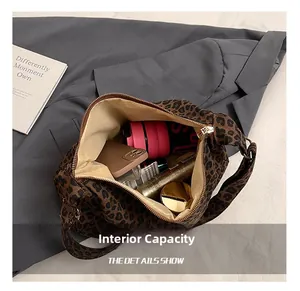 Macro view of leopard print tote bag showing large capacity for daily items