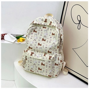 Détails de motifs de chiens mignons sur un sac à dos décontracté en toile blanc cassé