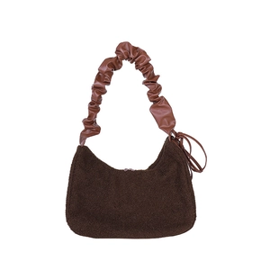 Deep brown faux fur hobo bag featuring a stylish brown gathered leather shoulder strap