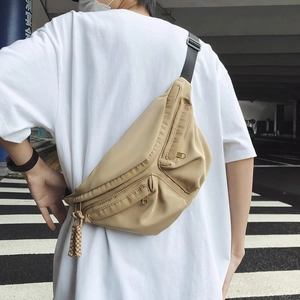 Mens khaki utility crossbody bag with multi-pocket design and adjustable strap