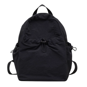 Large black minimalist multi-pocket backpack with drawstring design for school and travel