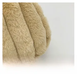 Close-up of premium brown faux fur fabric with plush vertical ribbed texture on tote bag