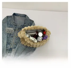 Top view showing the large capacity interior of this beige plush tote bag for daily essentials