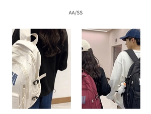 Minimalist large capacity backpacks for students in white, burgundy, and black colors