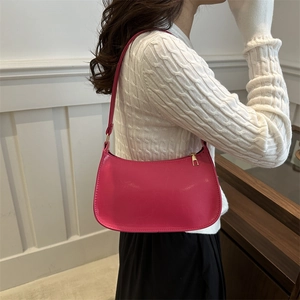 Hot pink leather crescent hobo bag for women with polished gold metal zipper accents