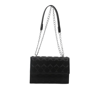 Modern black quilted crossbody bag with silver chain strap and minimalist leather flap
