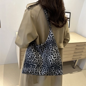 Chic leopard print tote bag for women with wide shoulder strap in casual stylish look