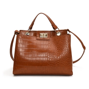 Sac à main rétro marron avec gaufrage crocodile, fermoir rotatif et anneau doré