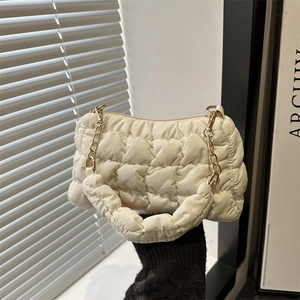 Quilted cloud bag in off-white fabric with gold chain strap and padded handle