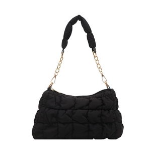 Quilted black cloud underarm bag with gold chain strap and padded handle