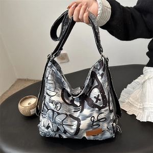 Large capacity canvas tote bag with blue and white graffiti prints for women