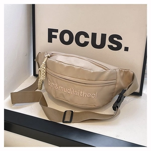 Beige casual canvas waist bag with embroidery and woven zipper pull strap