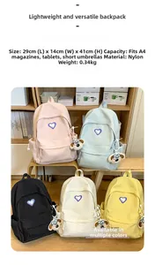Detailed size chart for nylon backpack with heart patch showing 29x14x41cm dimensions