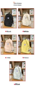 Collage of student backpacks in five colors with heart embroidery and dog plush charm