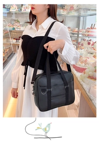 Japanese style black PU leather JK uniform bag with detachable strap in a bakery scene