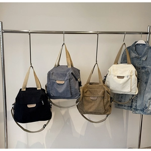 Corduroy tote bags in black, blue, khaki and white with adjustable shoulder straps