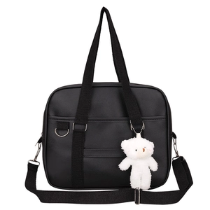 Japanese style black JK uniform tote bag with white plush bear charm and adjustable strap