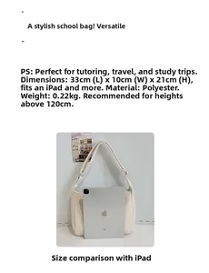 Detail view of cream canvas tote bag showing dimensions 33x10x21cm and 0.22kg weight